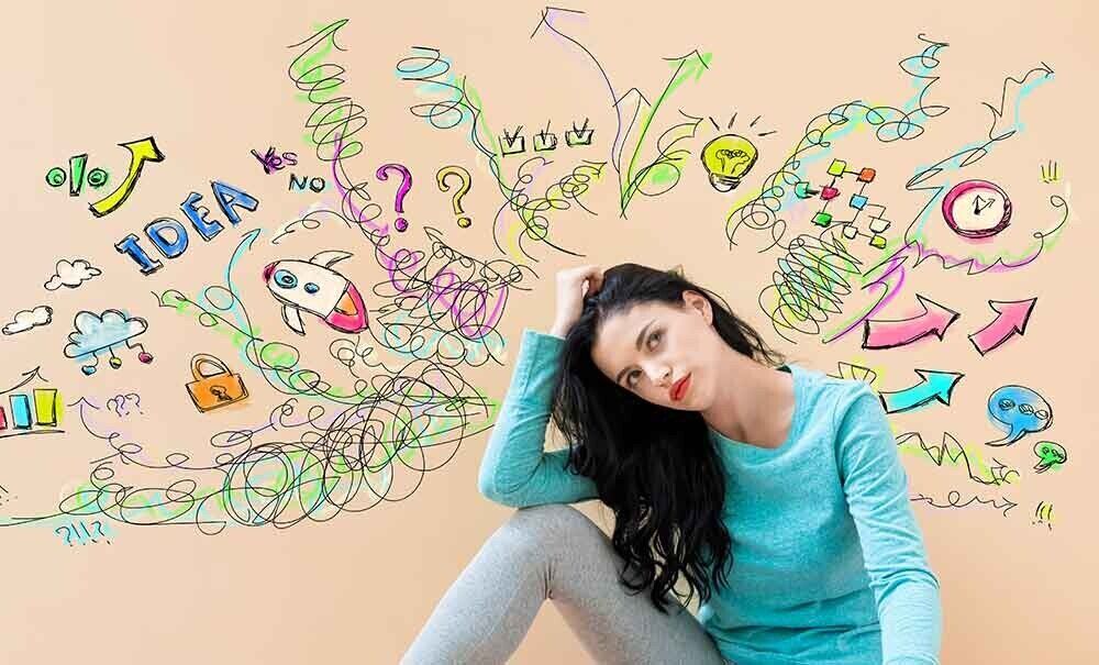 Mental clutter.  A photograph of a woman will an illustration represeting mental clutter